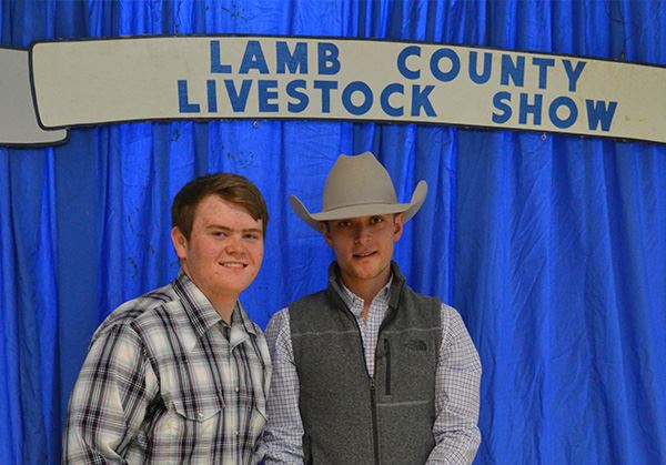 Two young men at the Lamb County Livestock Show